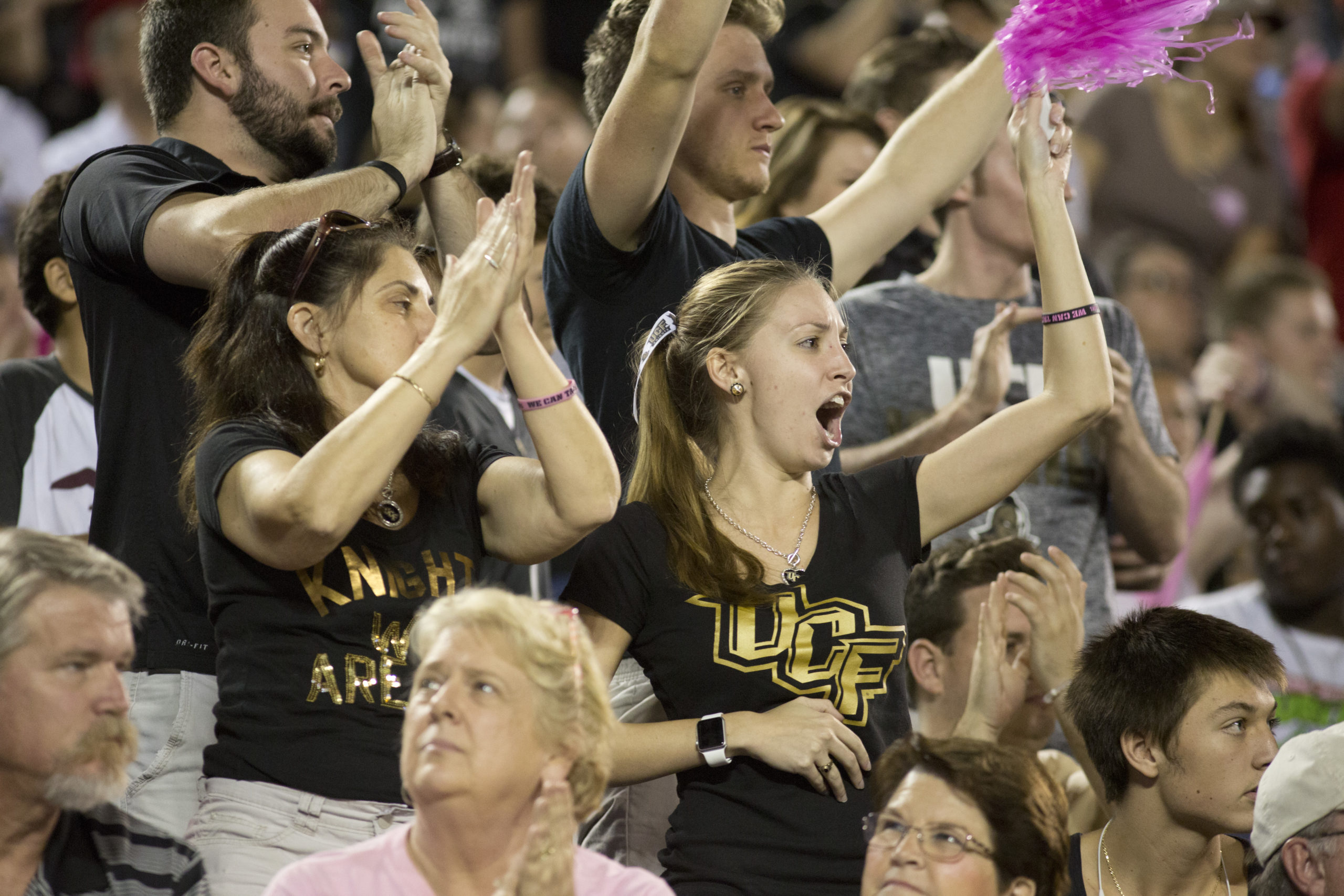 UCF fans cheer on their team at the Cure Bowl